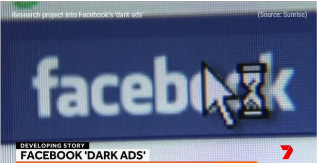 Computer cursor pointing to Facebook banner