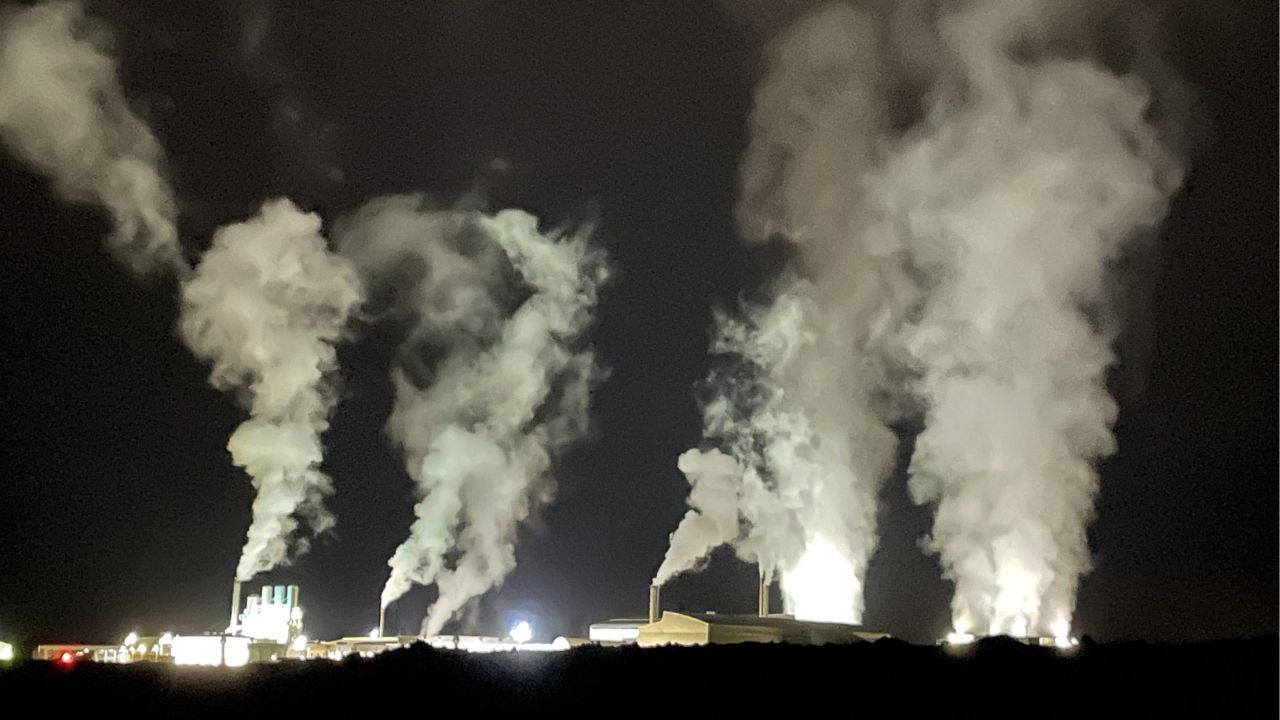Steam emitting from buildings at night