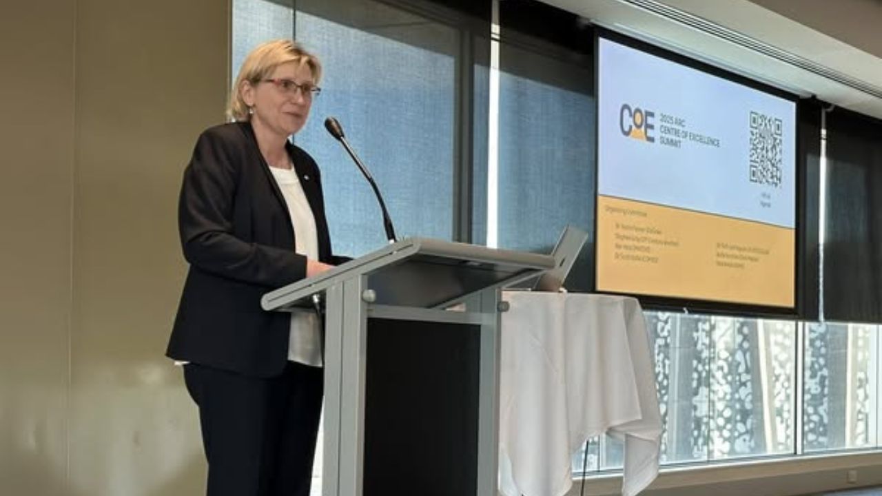 Ute Roessner presenting at the 2025 CoE Summit