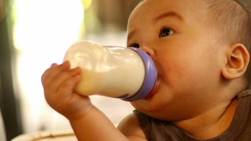 Baby drinking formula